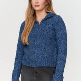 Cozy women’s blue zip-up sweater cardigan with chunky knit texture for stylish cold-weather layering.