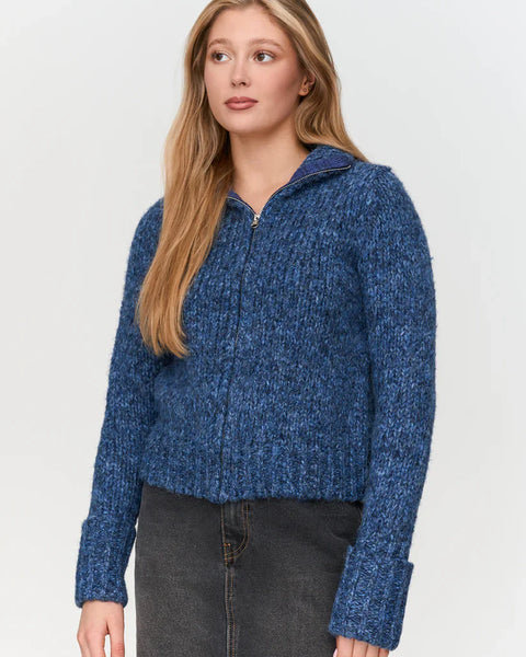 Cozy women’s blue zip-up sweater cardigan with chunky knit texture for stylish cold-weather layering.