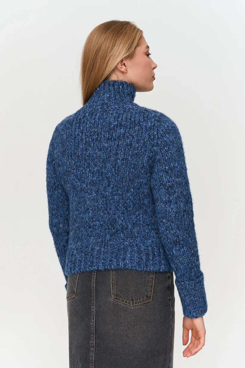 Women’s blue chunky knit zip-up cardigan sweater with collar for cozy fall and winter layering.
