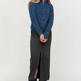 Women’s textured blue cardigan with front zipper, chunky knit construction, and modern relaxed silhouette.