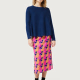 Cozy navy blue pullover sweater with modern oversized fit and artistic statement print loungewear aesthetic.