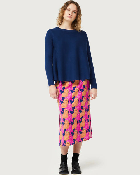 Cozy navy blue pullover sweater with modern oversized fit and artistic statement print loungewear aesthetic.