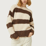 Soft boucle knit striped sweater featuring neutral earth tones and relaxed contemporary casual styling.