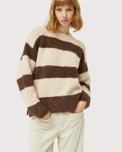 Soft boucle knit striped sweater featuring neutral earth tones and relaxed contemporary casual styling.