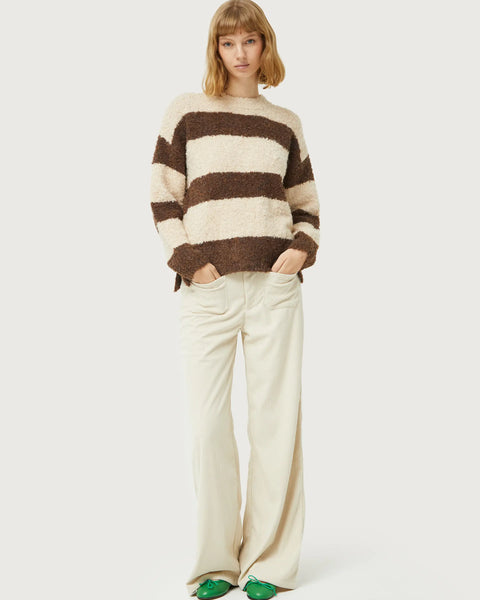 Contemporary fuzzy stripe sweater in neutral tones with relaxed fit and timeless cold-weather fashion style.
