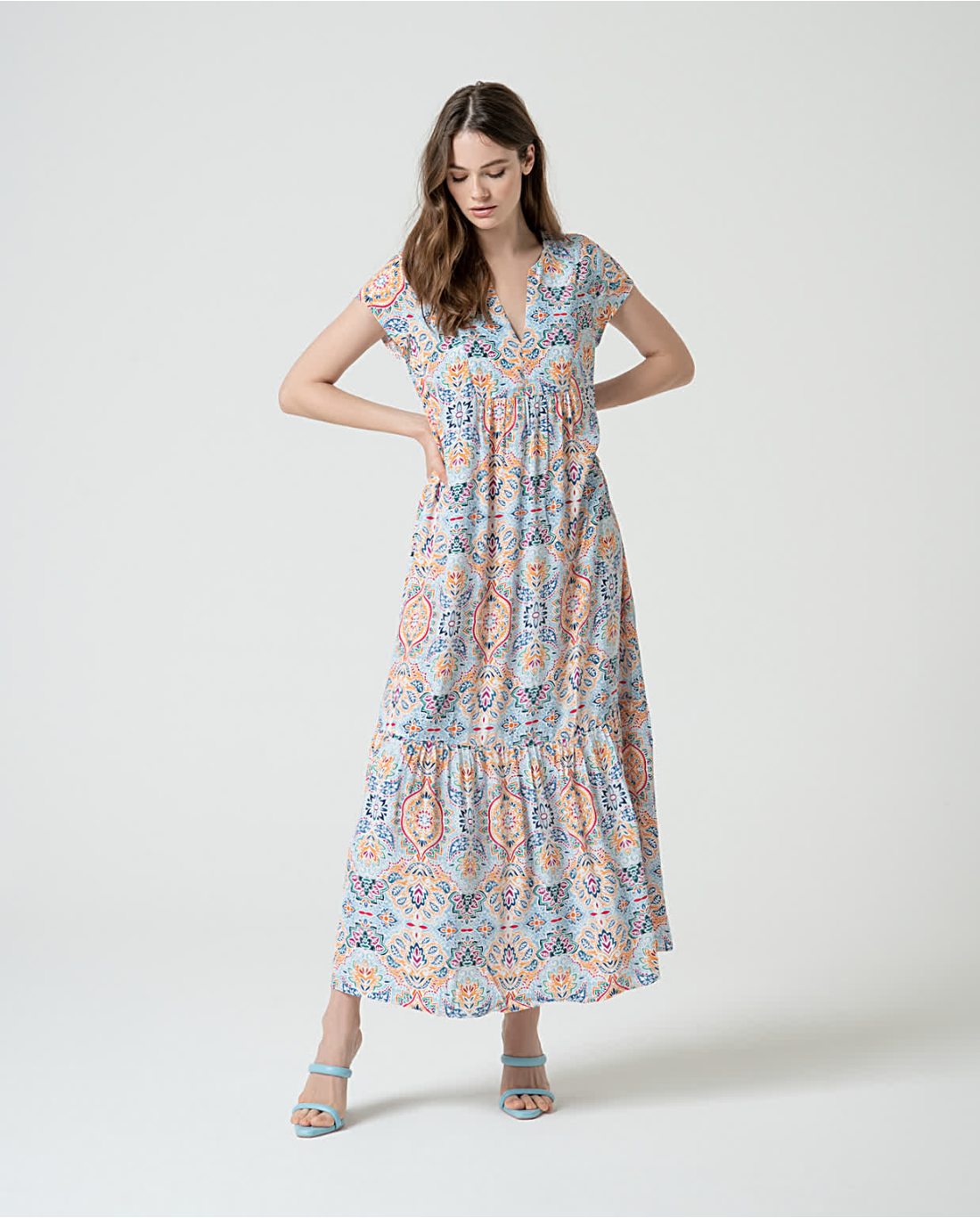 Women’s boho print maxi dress with colorful paisley pattern and breezy resortwear-inspired silhouette.