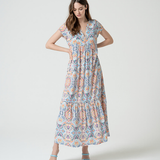 Women’s boho print maxi dress with colorful paisley pattern and breezy resortwear-inspired silhouette.