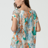 Casual luxe multicolor blouse with painterly print and modern capsule wardrobe appeal.