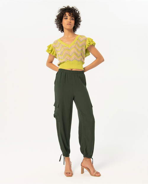 Contemporary utility joggers featuring soft olive fabric, relaxed fit, and ankle tie details for effortless streetwear-inspired style.