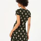 Fashion-forward olive green mini dress featuring tiny floral motifs and flattering tailored fit for everyday elegance.