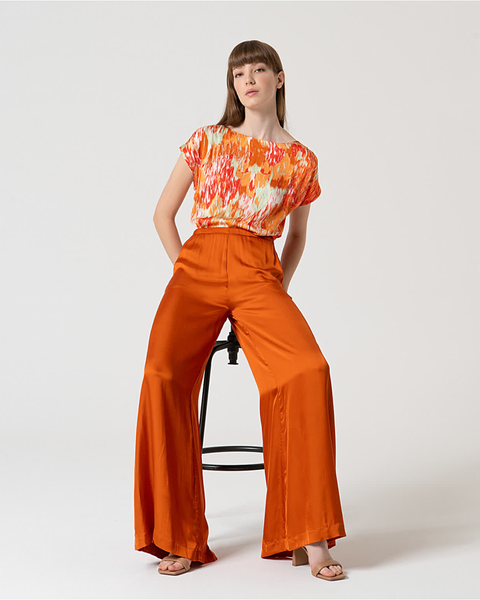 Rust orange wide-leg palazzo trousers for casual and dressy outfits.
