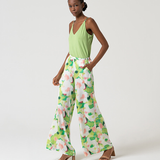 Trendy women’s floral wide leg pants with watercolor print and relaxed luxe summer outfit aesthetic.