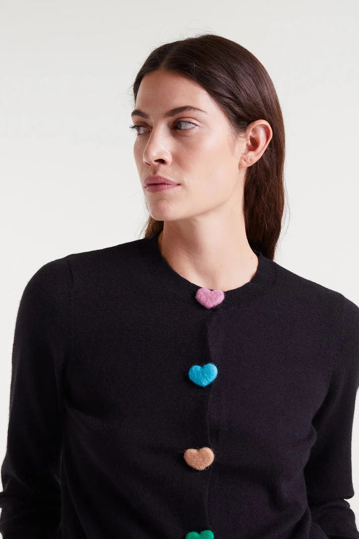 Women's black fine knit cardigan with colorful heart-shaped buttons, classic crew neckline and long sleeves for playful everyday layering.