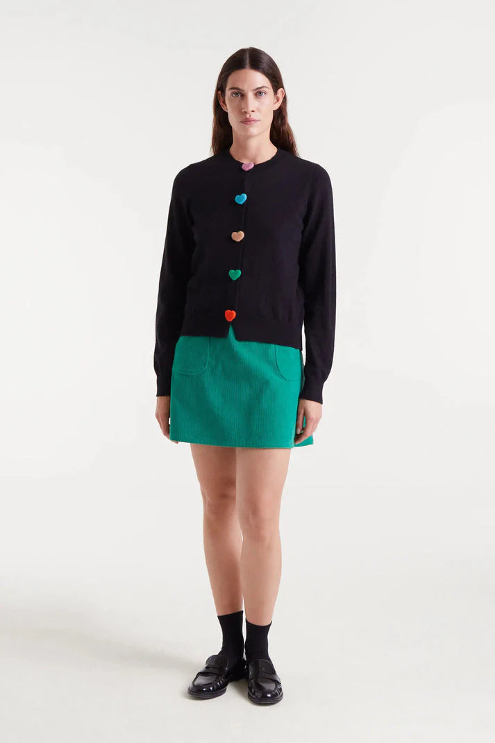 Boutique women's black crew neck cardigan featuring bright multicolor heart buttons and fine knit texture for a playful statement look.