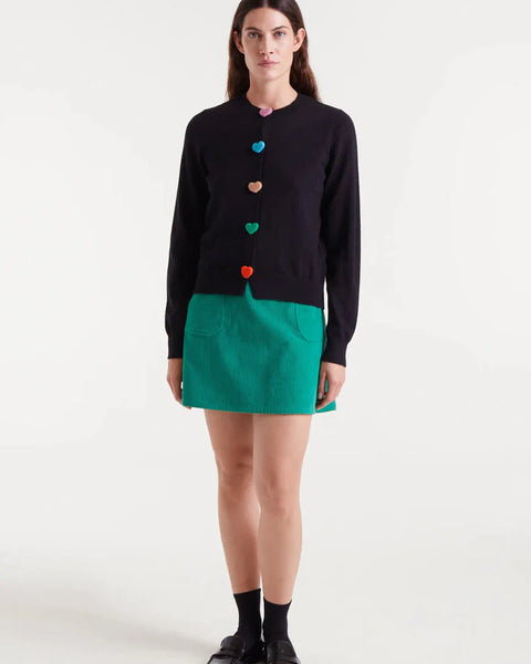 Boutique women's black crew neck cardigan featuring bright multicolor heart buttons and fine knit texture for a playful statement look.