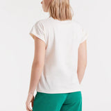 Women’s white dog graphic tee featuring a playful puppy illustration and relaxed fit for trendy casual summer outfits.
