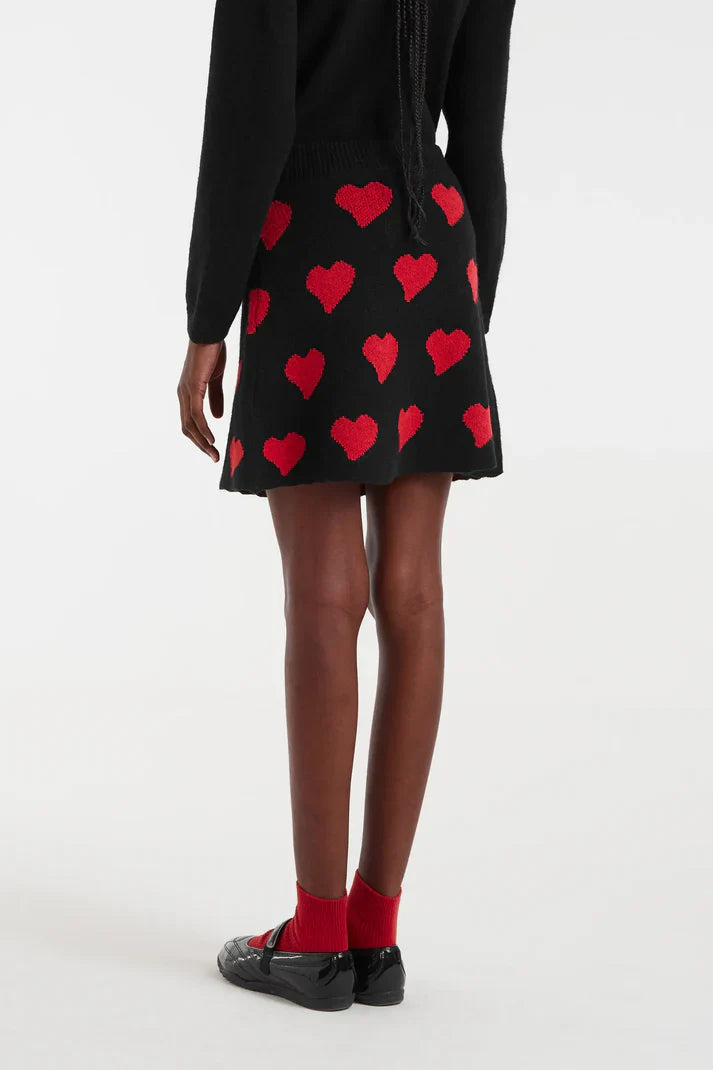 Women’s graphic knit skirt with bold red heart accents and modern silhouette