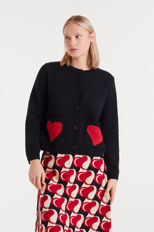 Women’s soft black cardigan with bold red heart graphic pockets