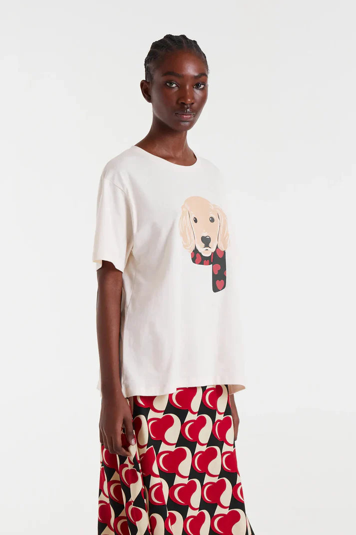 Trendy women’s graphic T-shirt featuring a cute dog design, white crew neck, and relaxed short-sleeve silhouette.