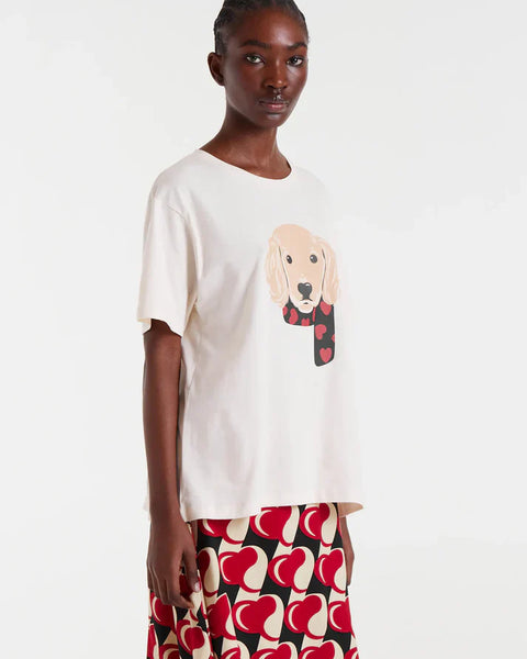 Trendy women’s graphic T-shirt featuring a cute dog design, white crew neck, and relaxed short-sleeve silhouette.