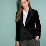 Women’s black velvet blazer with satin-trim lapels and tailored fit for elegant evening wear, holiday parties, and special occasions.
