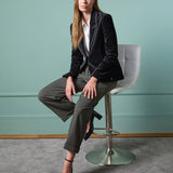 Women’s fitted black velvet blazer for sophisticated formal wear, holiday party outfits, dinner looks, and evening fashion.
