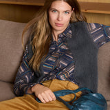Boutique women's multicolor patterned button-up shirt in navy, teal and beige for modern everyday styling.