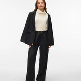 Women's minimalist birch colored roll-neck sweater featuring a relaxed silhouette for versatile work, travel and everyday styling.