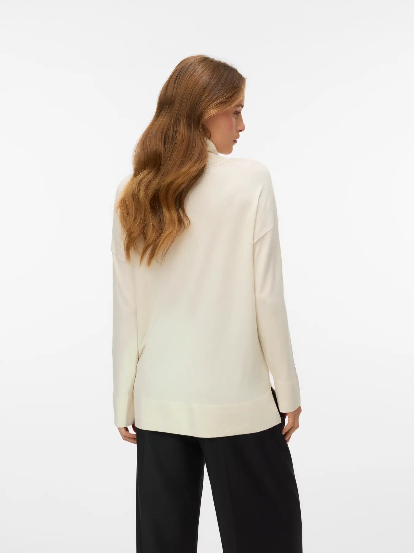 Women's timeless ivory roll-neck sweater with long sleeves and relaxed fit for an elevated capsule wardrobe.