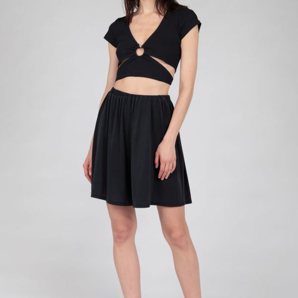 Women's black wide-legged flowy shorts with comfortable elastic waist and flattering fit.