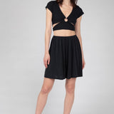 Women's pull-on black wide-legged shorts with gathered waist and comfortable fit.