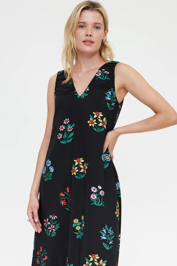 Women's lightweight black summer dress with multicolor floral print, sleeveless design and feminine tiered hem for effortless everyday elegance.