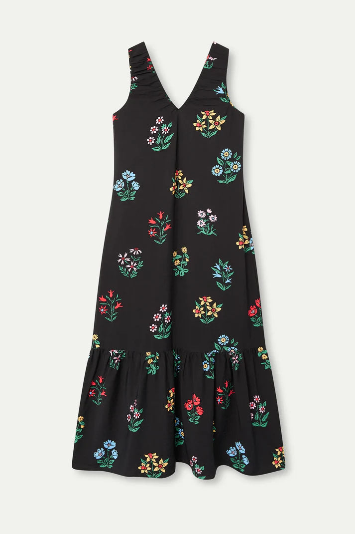 Premium women's floral maxi dress in black featuring an all-over garden print, relaxed fit and tiered hem for vacation wardrobes and boutique fashion.