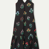 Premium women's floral maxi dress in black featuring an all-over garden print, relaxed fit and tiered hem for vacation wardrobes and boutique fashion.