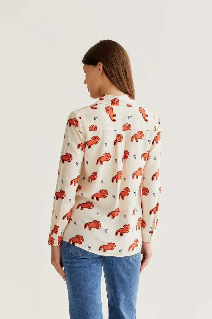Cream printed women's shirt featuring coral animal motifs, classic collar and button-front design for chic casual and office wear.
