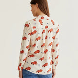 Cream printed women's shirt featuring coral animal motifs, classic collar and button-front design for chic casual and office wear.