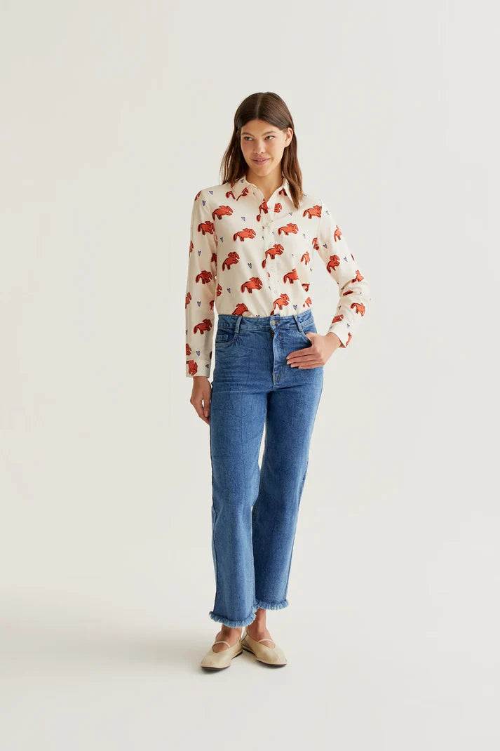 Women's cream printed button-up shirt featuring artistic coral canine illustrations, long sleeves and modern boutique style.