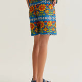 Lightweight floral summer shorts with colorful vintage flower print, relaxed fit and comfortable pull-on waistband for beach holidays.