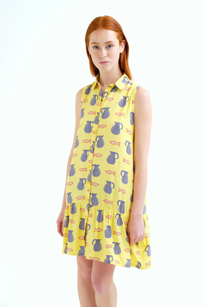 Lightweight sleeveless vacation dress featuring an artistic fish and ceramic pitcher pattern on a vibrant yellow background.