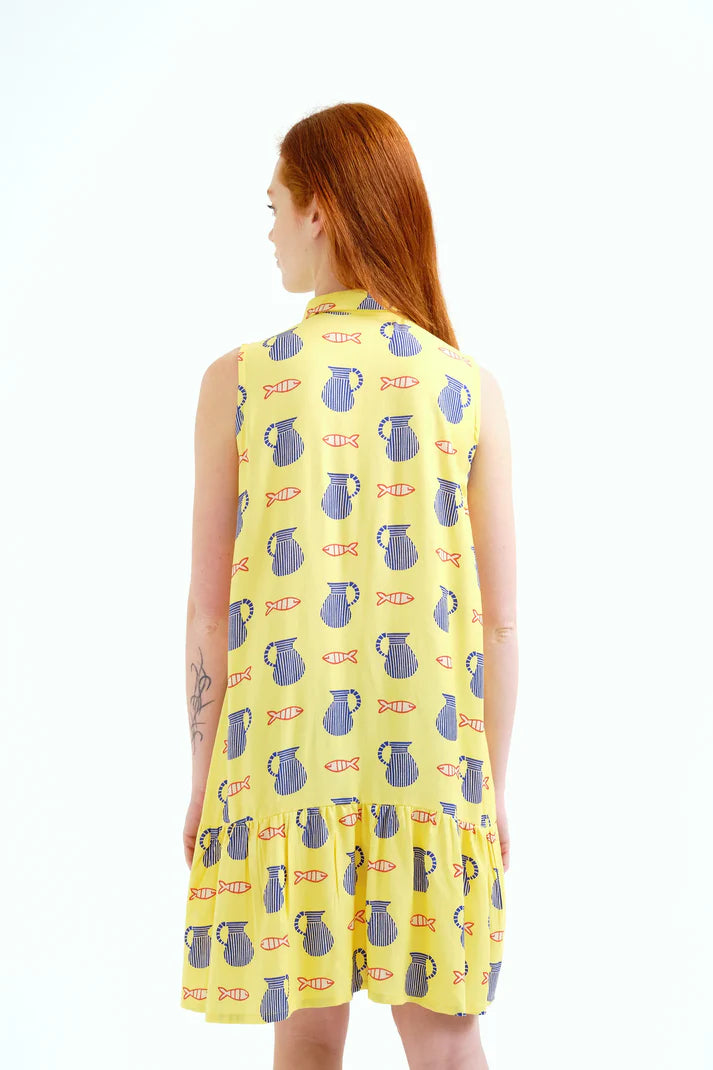 Contemporary sleeveless shirt dress showcasing artistic coastal illustrations, lightweight construction, and cheerful summer style.