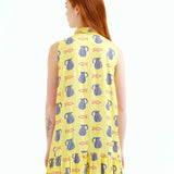 Contemporary sleeveless shirt dress showcasing artistic coastal illustrations, lightweight construction, and cheerful summer style.