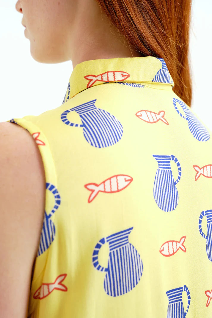 Women's casual yellow collared dress with whimsical ocean-inspired motifs, feminine tiered hem, and easy everyday styling.