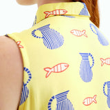 Women's casual yellow collared dress with whimsical ocean-inspired motifs, feminine tiered hem, and easy everyday styling.