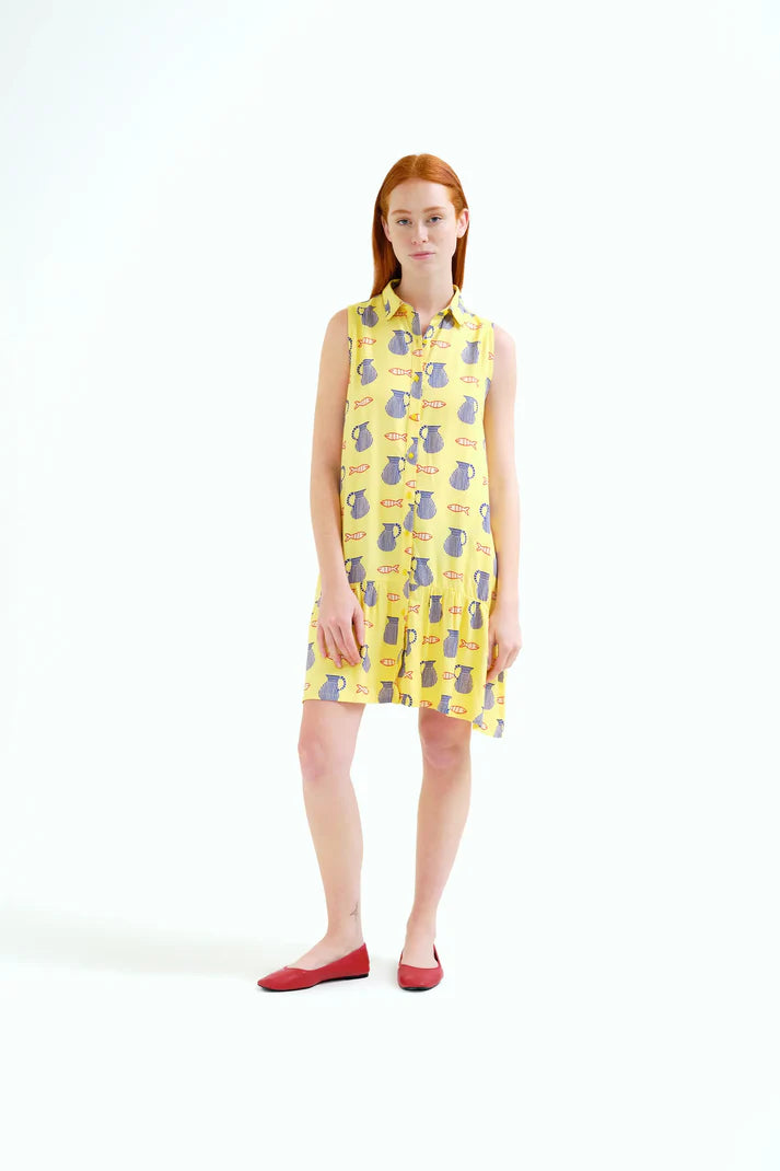 Women's resort dress featuring an all-over fish and pitcher print, collared neckline, and flowy ruffle hem for summer vacations.