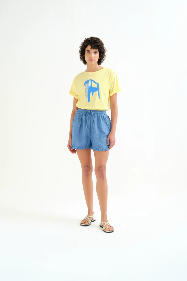 Soft cotton graphic T-shirt with modern blue print, oversized silhouette, and contemporary casual styling for spring and summer.