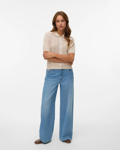 Elegant oatmeal short sleeve knit cardigan featuring delicate pointelle detailing, scalloped collar and classic button-front styling.