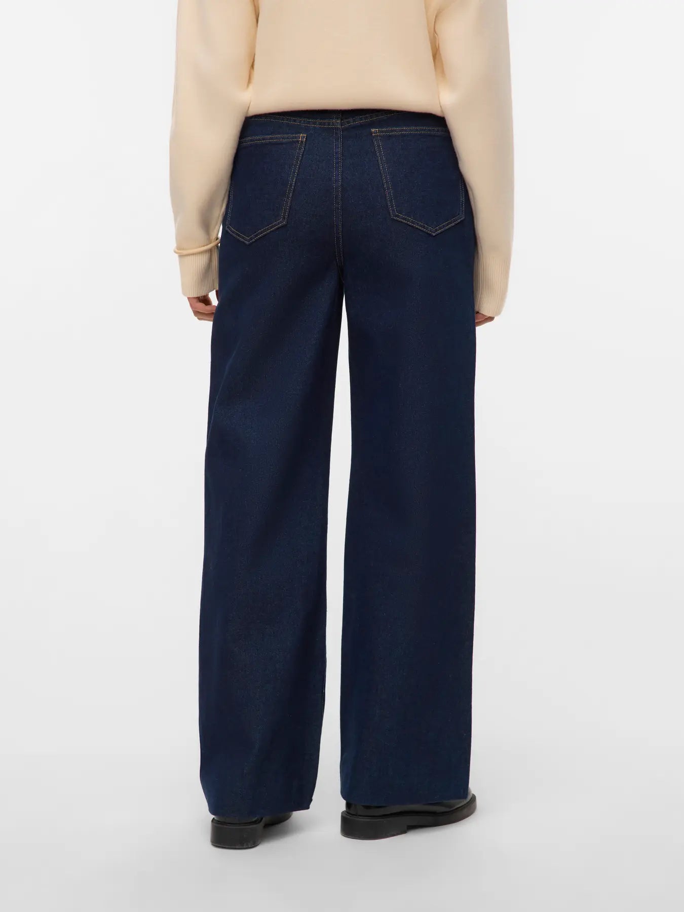 Women's full-length indigo wide-leg jeans with high waist and relaxed fit for smart casual and weekend outfits.