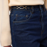 Women's high-waisted dark indigo wide-leg jeans with contrast stitching and full-length relaxed fit for everyday styling.