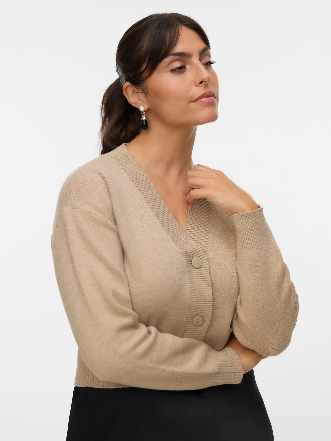 Women's classic camel beige button-up cardigan with relaxed silhouette for effortless layering and transitional season outfits.
