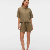 Boutique women's olive woven blouse with classic collar, short sleeves and breathable linen-blend fabric for effortless capsule wardrobe dressing.